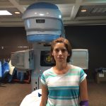 Jelena standing in front of a radiation machine